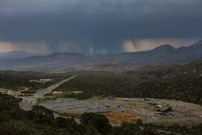 Storm sweeps through Vegas, swamping roads, stranding people | iNFOnews.ca