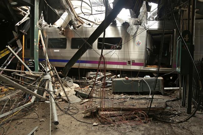 Damaged NJ Transit train removed from terminal after crash | iNFOnews.ca CP575359657