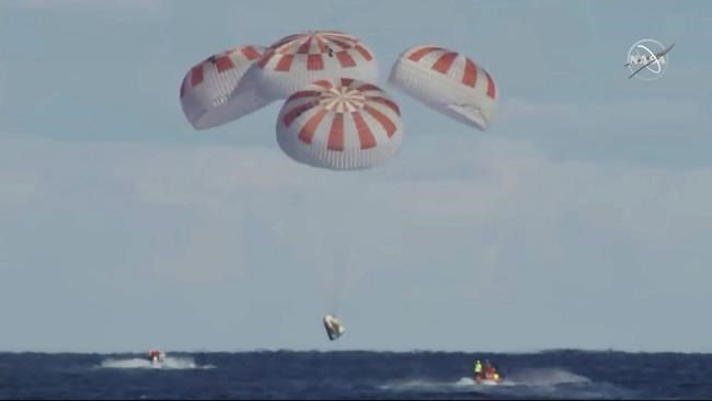 SpaceX crew capsule ends test flight with ocean splashdown | iNFOnews.ca SpaceX crew capsule ends test flight with ocean splashdown | iNFOnews.ca