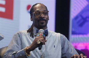 Texas state trooper cited for posing for photo with Snoop Dogg at South by Southwest festival | iNFOnews.ca CP32541167