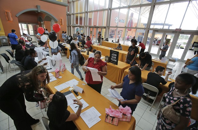 US hiring surge drives unemployment down to 5 per cent, boosts chances of Fed rate hike | iNFOnews.ca CP35223139