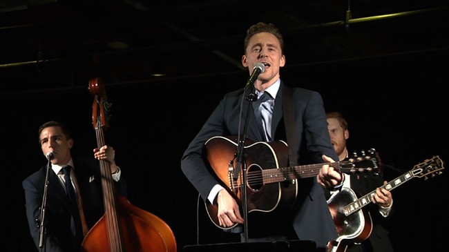 British actor Tom Hiddleston sings on stage as Hank Williams after Nashville movie premiere | iNFOnews.ca CP34996116