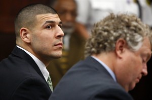 Aaron Hernandez, charged in 3 killings, featured on Florida Gators and Patriots 2014 calendars | iNFOnews.ca CP28981583