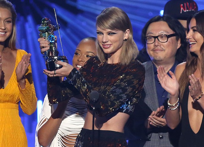 Taylor Swift's '1989 World Tour' tops Pollstar's 2015 list with $250.4M grossed; AC/DC is 2nd | iNFOnews.ca CP35858492
