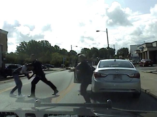 Dashcam video shows white cop punching black man during stop | iNFOnews.ca