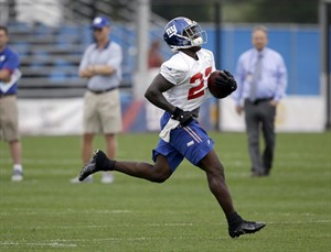 Former Giants RB David Wilson to train in triple jump with eye on making 2016 Olympic team | iNFOnews.ca CP29546499