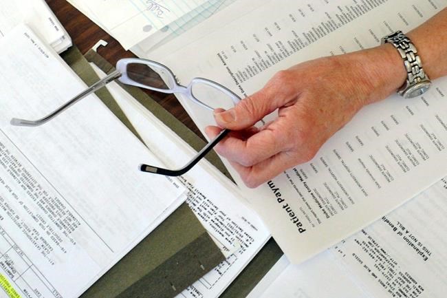 US survey finds smaller decline in medical bill worries | iNFOnews.ca CP313600872