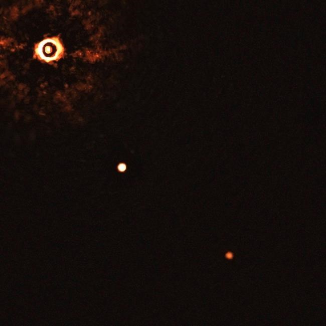 Telescope snaps family portrait of 2 planets around baby sun | iNFOnews.ca Telescope snaps family portrait of 2 planets around baby sun | iNFOnews.ca