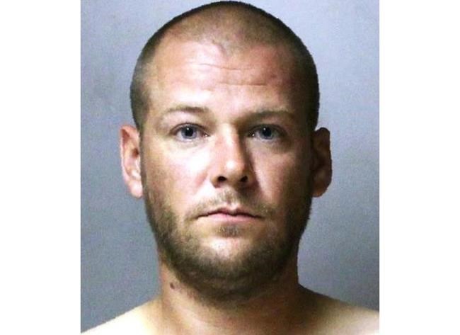 The Latest: Man ordered held in slayings of wife, trooper | iNFOnews.ca