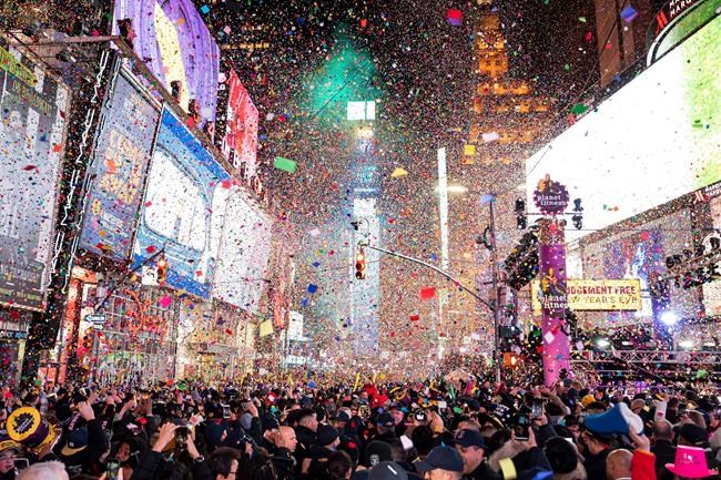 Cheers, tears, prayers for 2020: A new decade is ushered in | iNFOnews.ca CP775611608