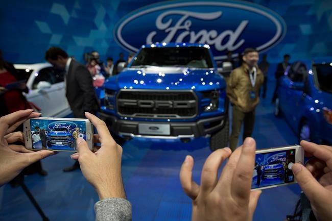 Ford's 3Q profit falls on recall, truck launch | iNFOnews.ca CP1636331030