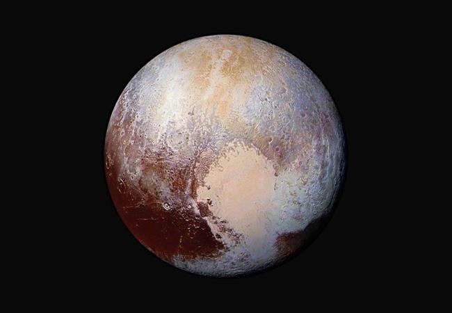 Icy basin in Pluto's heart may be natural sinkhole | iNFOnews.ca Icy basin in Pluto's heart may be natural sinkhole | iNFOnews.ca