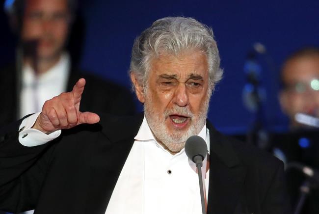 After recovering from virus, Domingo vows to clear name | iNFOnews.ca CP587430188