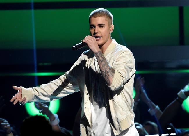 In new report, man claims Justin Bieber punched him in June | iNFOnews.ca
