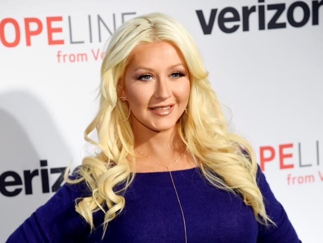 Aguilera pens song to benefit shooting victims' families | iNFOnews.ca Aguilera pens song to benefit shooting victims' families | iNFOnews.ca