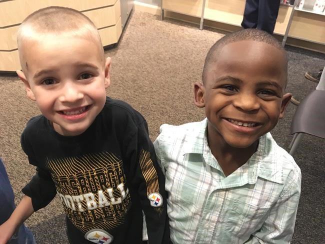 Story of 2 boys, 1 white and 1 black, teaches racial harmony | iNFOnews.ca CP308156005