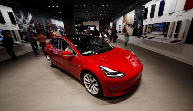 Tesla to close stores to reduce costs for $35,000 Model 3 | iNFOnews.ca