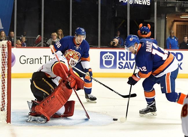 Hickey's OT goal helps Isles stay strong at home vs Flames | iNFOnews.ca Hickey's OT goal helps Isles stay strong at home vs Flames | iNFOnews.ca