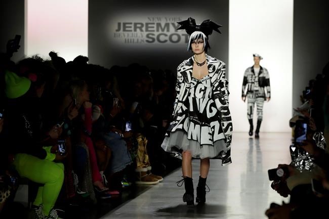 Extra! Jeremy Scott makes news (literally) on the runway | iNFOnews.ca