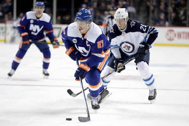 Trouba, Lowry rally Jets to 3-1 win over Islanders | iNFOnews.ca Trouba, Lowry rally Jets to 3-1 win over Islanders | iNFOnews.ca