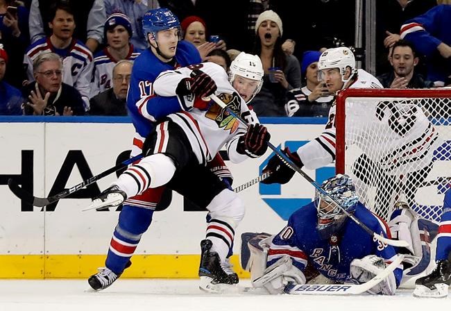 Sharp breaks tie in third, Blackhawks beat Rangers 5-2 | iNFOnews.ca