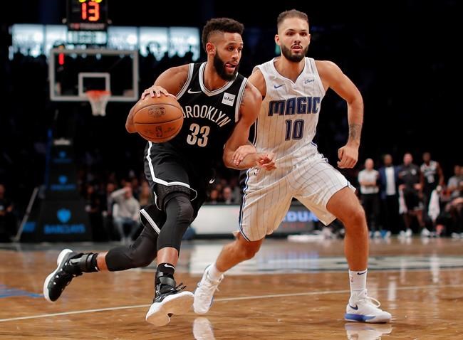 Nets' national anthem singer kneels to finish performance | iNFOnews.ca Nets' national anthem singer kneels to finish performance | iNFOnews.ca