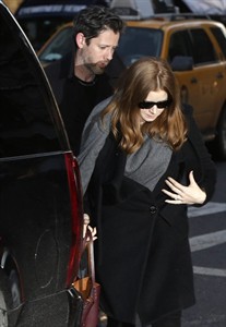 Valentino issues speedy apology for promoting pricey bag on arm of Amy Adams at Hoffman wake | iNFOnews.ca