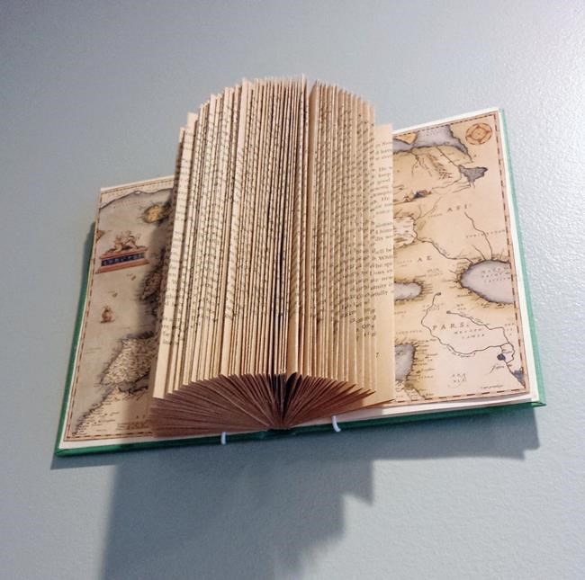 A new use for an old book? Fold it into a work of art | iNFOnews.ca