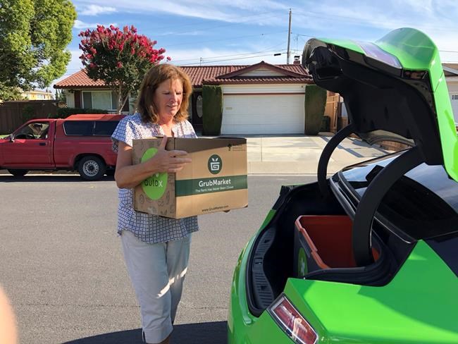 Humans still heft groceries on-demand, for now | iNFOnews.ca CP1876785567