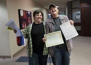 Married gay couples may find filing their tax returns more complex, result in higher tax bill | iNFOnews.ca CP26906805