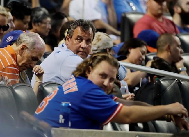 Foul! NJ gov Christie catches ball at Mets game, gets booed | iNFOnews.ca Foul! NJ gov Christie catches ball at Mets game, gets booed | iNFOnews.ca