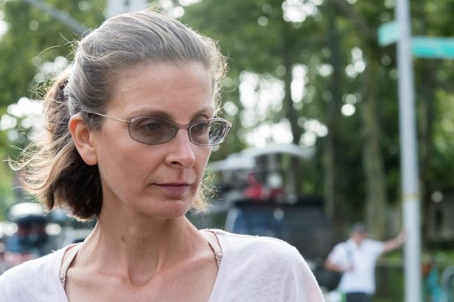 Heiress charged with aiding alleged cult, free on $100M bond | iNFOnews.ca Heiress charged with aiding alleged cult, free on $100M bond | iNFOnews.ca