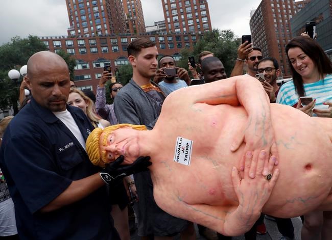 Naked Donald Trump statues pop up in cities across the US | iNFOnews.ca