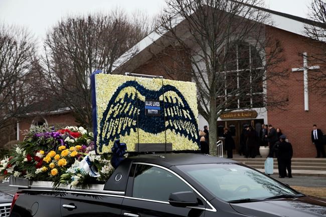 Funeral held for NYPD detective killed by friendly fire | iNFOnews.ca Funeral held for NYPD detective killed by friendly fire | iNFOnews.ca