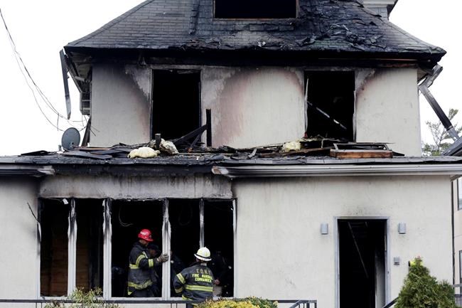 The Latest: Officials say fatal fire caused by lit menorah | iNFOnews.ca