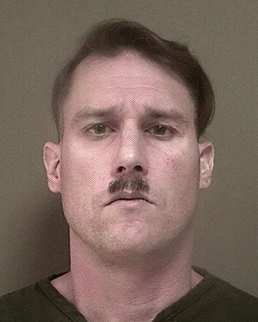 Man with Hitler moustache charged in weapons, ammo case | iNFOnews.ca