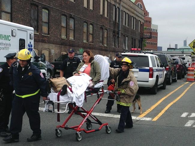 The Latest: Crash investigation hampered by safety issues | iNFOnews.ca