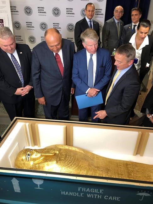 Officials says ancient gilded coffin arrived in Egypt | iNFOnews.ca