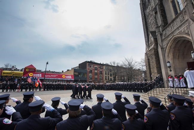 Mourners pack church, streets for medic struck by ambulance | iNFOnews.ca Mourners pack church, streets for medic struck by ambulance | iNFOnews.ca