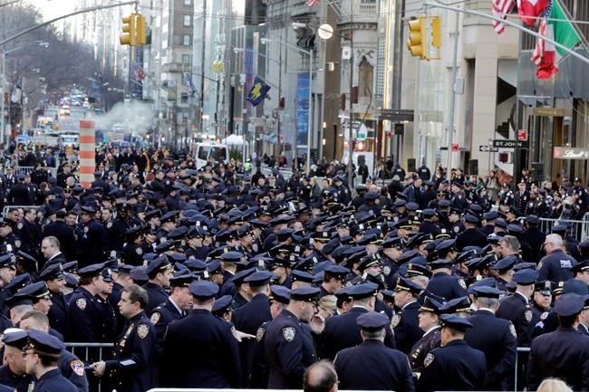 The Latest: Funeral for paralyzed officer draws to a close | iNFOnews.ca
