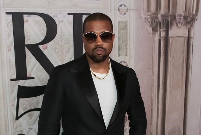 Kanye West meets Uganda's president, gifts pair of sneakers | iNFOnews.ca CP360453885