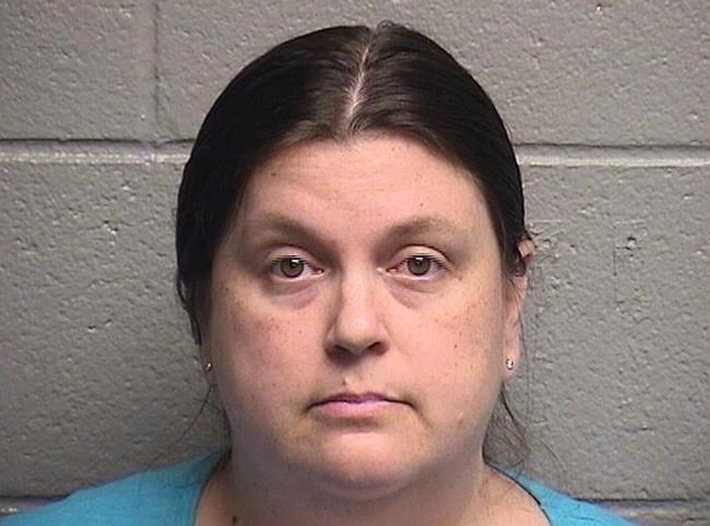 Teacher charged with threatening to 'shoot up' her school | iNFOnews.ca CP344539098