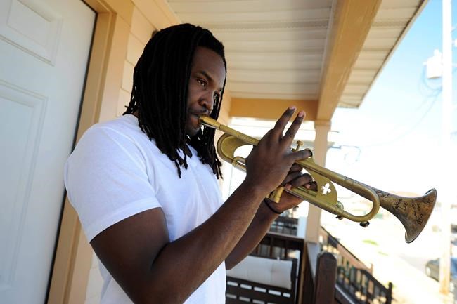 New Orleans musician offers kids trumpets for guns | iNFOnews.ca