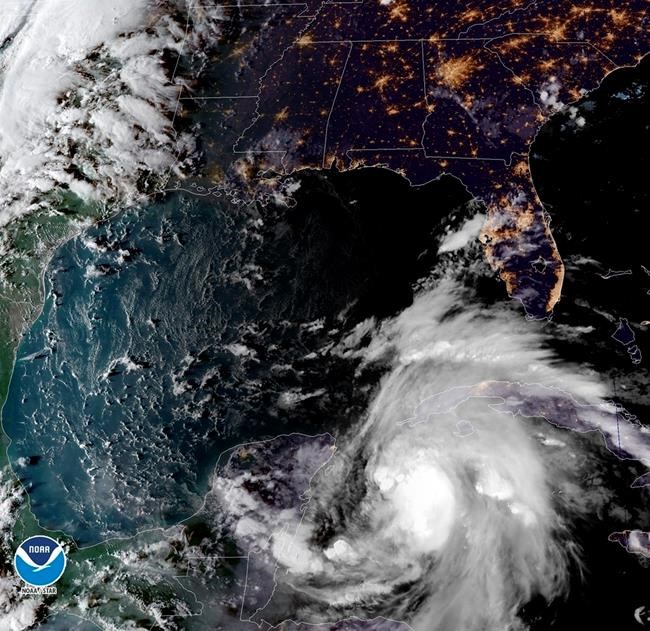 The Latest: Michael crawls north, rising threat to Florida | iNFOnews.ca CP240845583