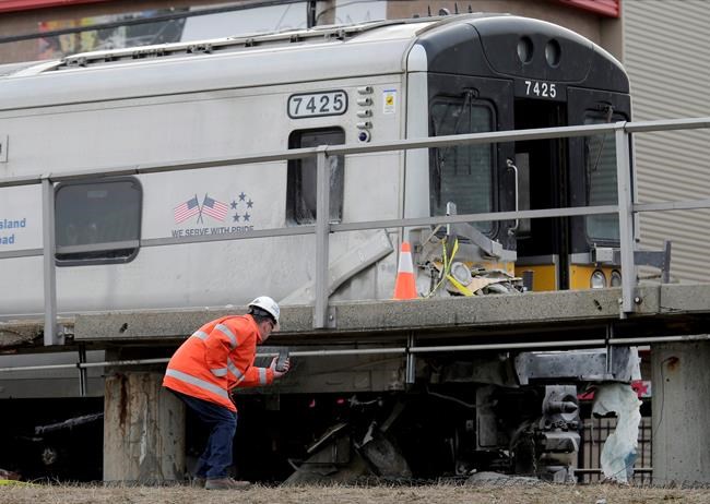 The Latest: Witness says car in train crash was fleeing | iNFOnews.ca CP1757975976