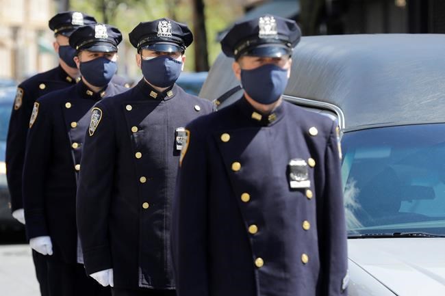 Masks, gloves, tears as NYPD mourns commander lost to virus | iNFOnews.ca