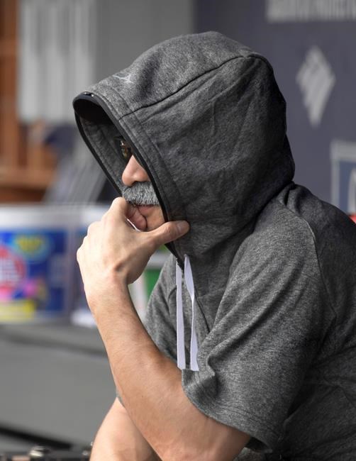 Ichi-who? Suzuki sits on M's bench in fake moustache disguise | iNFOnews.ca