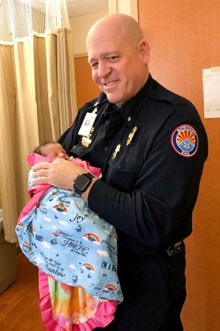 Woman names baby after medic who saved her during wildfire | iNFOnews.ca
