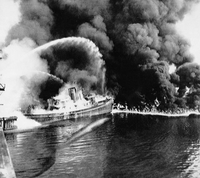 Fish in river that famously caught fire now OK'd for dinner | iNFOnews.ca