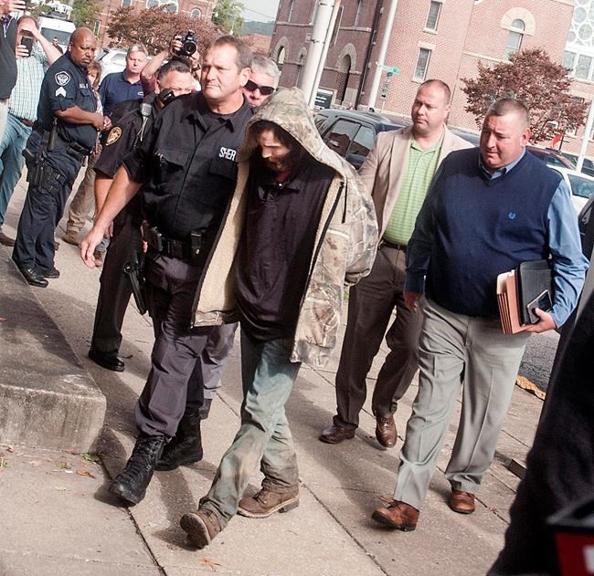 The Latest: Sheriff IDs 3 slain adults, suspect arrested | iNFOnews.ca CP248267206